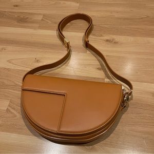 Patou Crossbody Saddle Bag